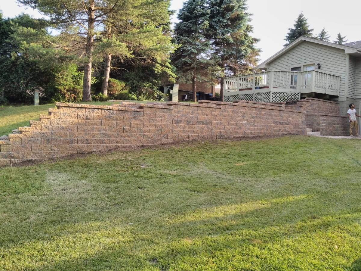 Large retaining wall made with brown stone